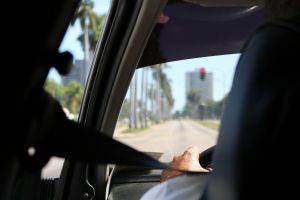 Houston traffic ticket lawyer consulting with a driver in a legal office