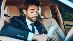 Speeding ticket lawyer reviewing citation