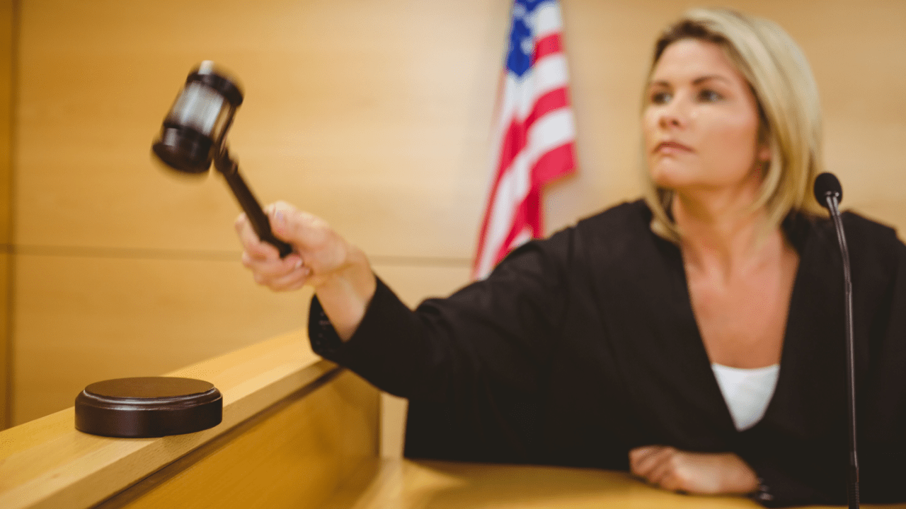 Attorney and client celebrate in courtroom — how often do speeding tickets get dismissed?