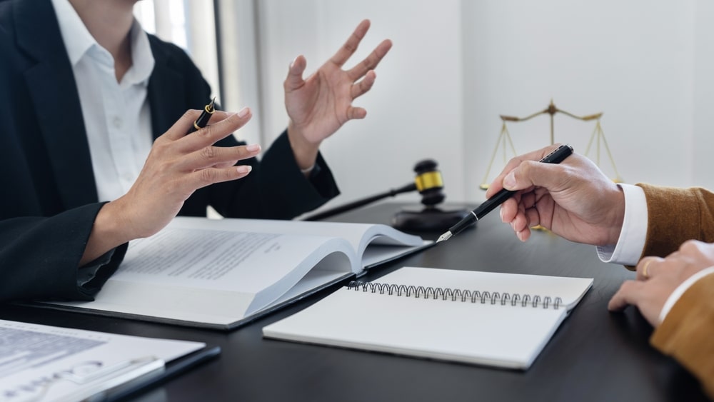 Lawyer advising client on how to appeal a license suspension
