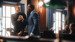 Man and attorney celebrate in courtroom — what is the best plea for a speeding ticket?