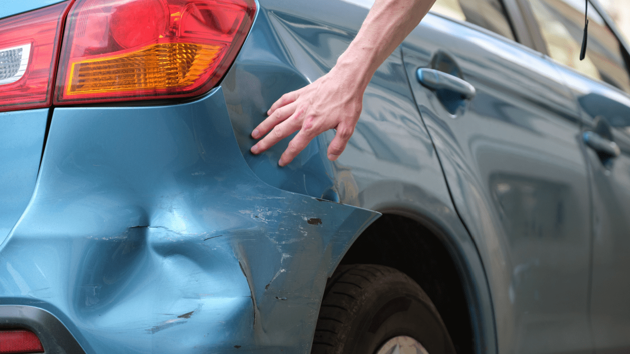 Car accident damage showing how does reckless driving affect insurance rates