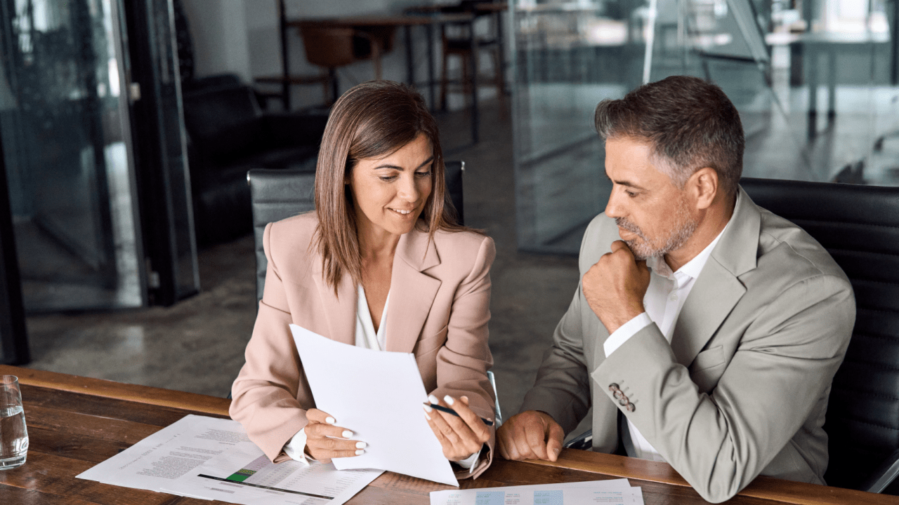 Professional consultants helping client lower insurance after reckless driving violation