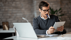 Attorney considering should I plead guilty to reckless driving while reviewing legal documents and case files