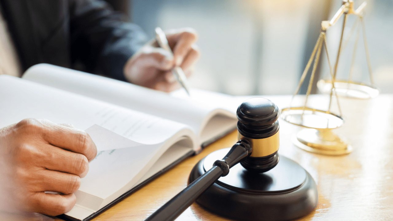 Should you get a lawyer for reckless driving Reddit advice - legal consultation with gavel and scales of justice