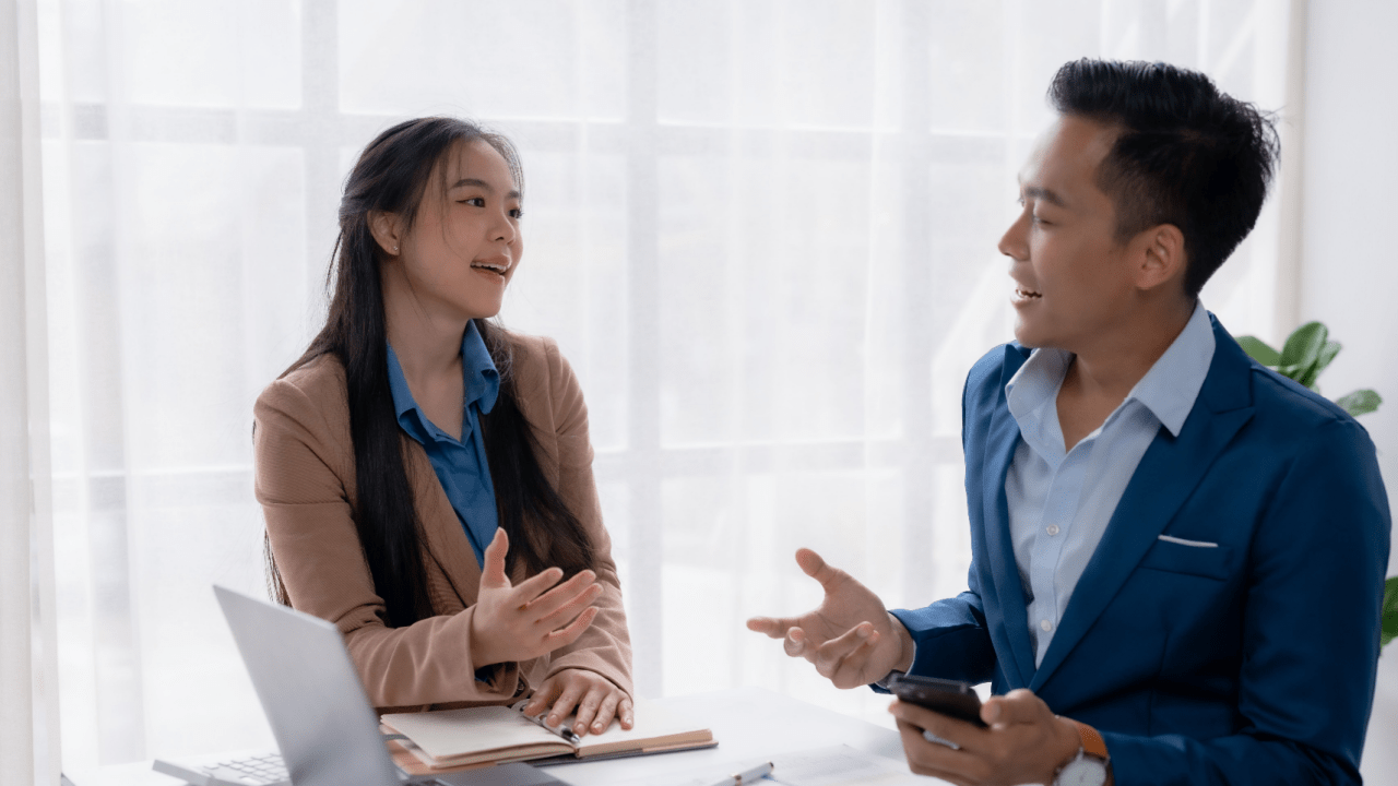 Professional lawyer consulting with client about how can a lawyer help reduce points on license during legal meeting