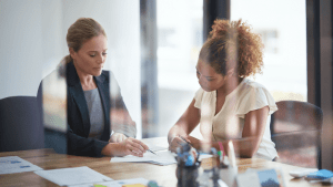 Professional female attorney providing consultation with client in modern office, demonstrating can a free consultation with a traffic lawyer help clients understand their legal options