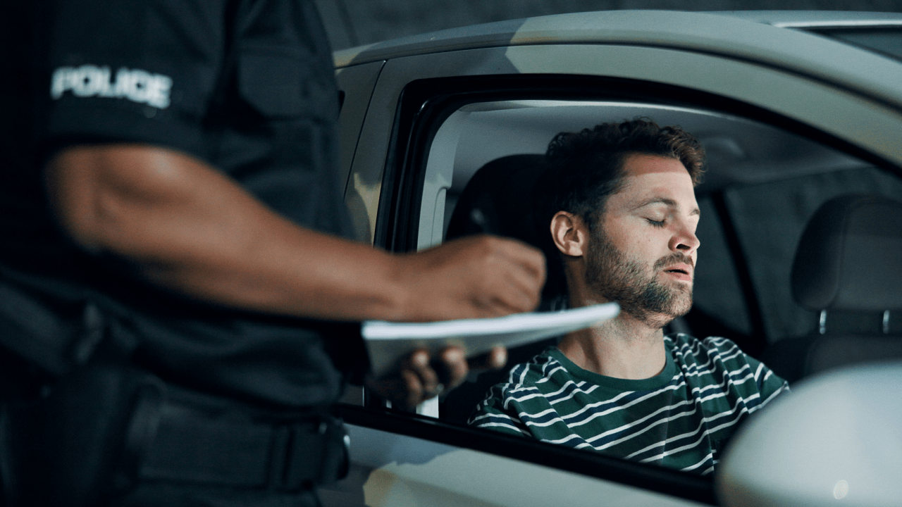 Driver receiving citation with penalties insurance and long term impact considerations for traffic violations