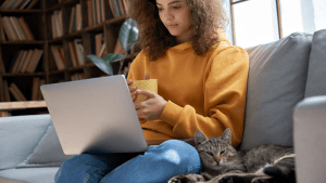 Woman researching specialized traffic violation cases on laptop for online legal consultation