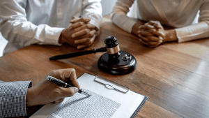 Traffic court & legal process consultation with attorney and client reviewing legal documents