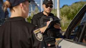 Police officer writing traffic ticket during traffic stop - can I plead no contest to traffic ticket situation