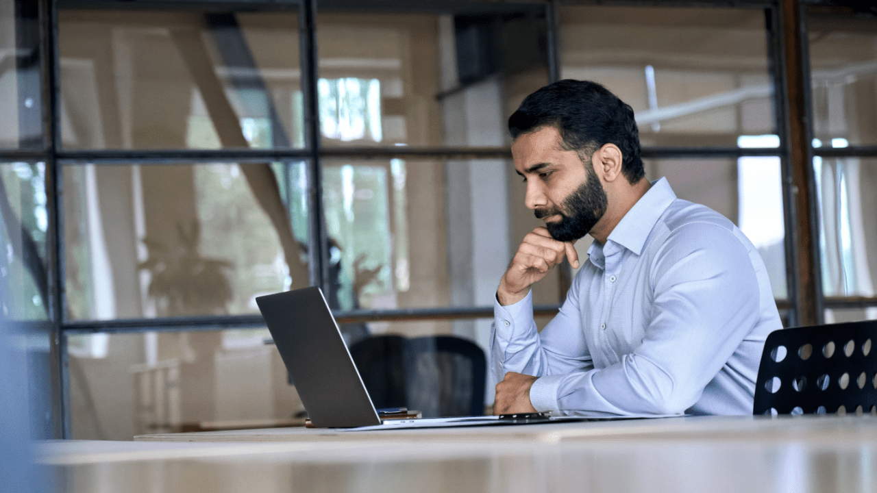 Cellphone use while driving ticket lawyer consulting with client in modern office setting