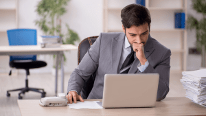 Lawyer for commercial driver traffic violations consulting client in professional office setting