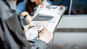 Lawyer for removing points from driving record reviewing legal documents and traffic violation paperwork