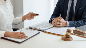 Traffic court arraignment process explained during legal consultation with attorney and client