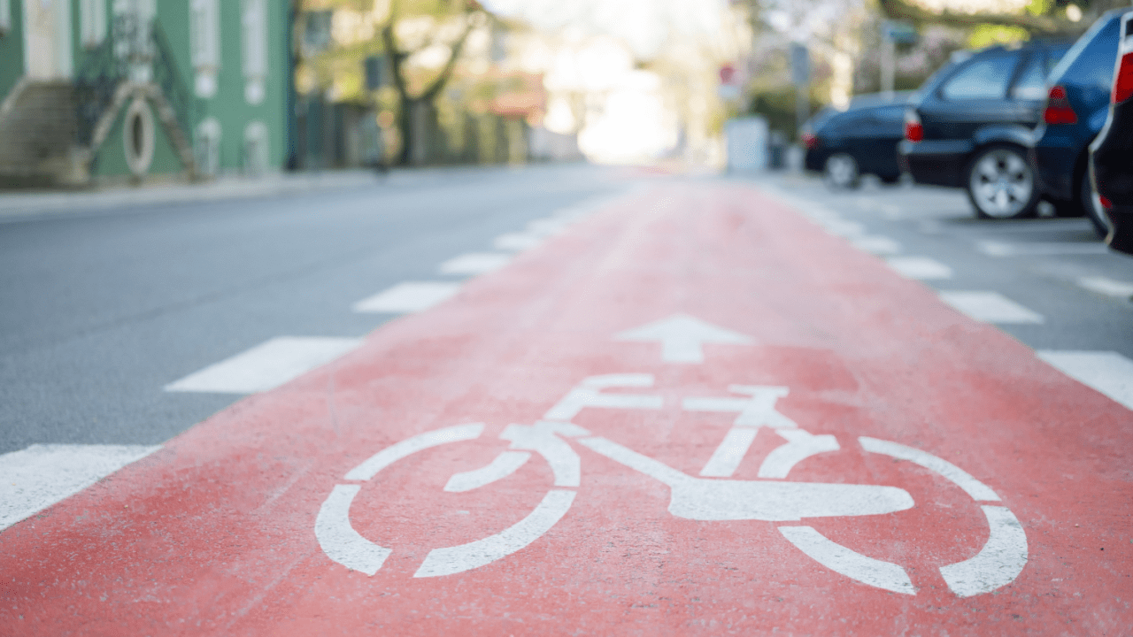 Dedicated bicycle lane marking showing do cyclists have to obey traffic laws applies to bike paths