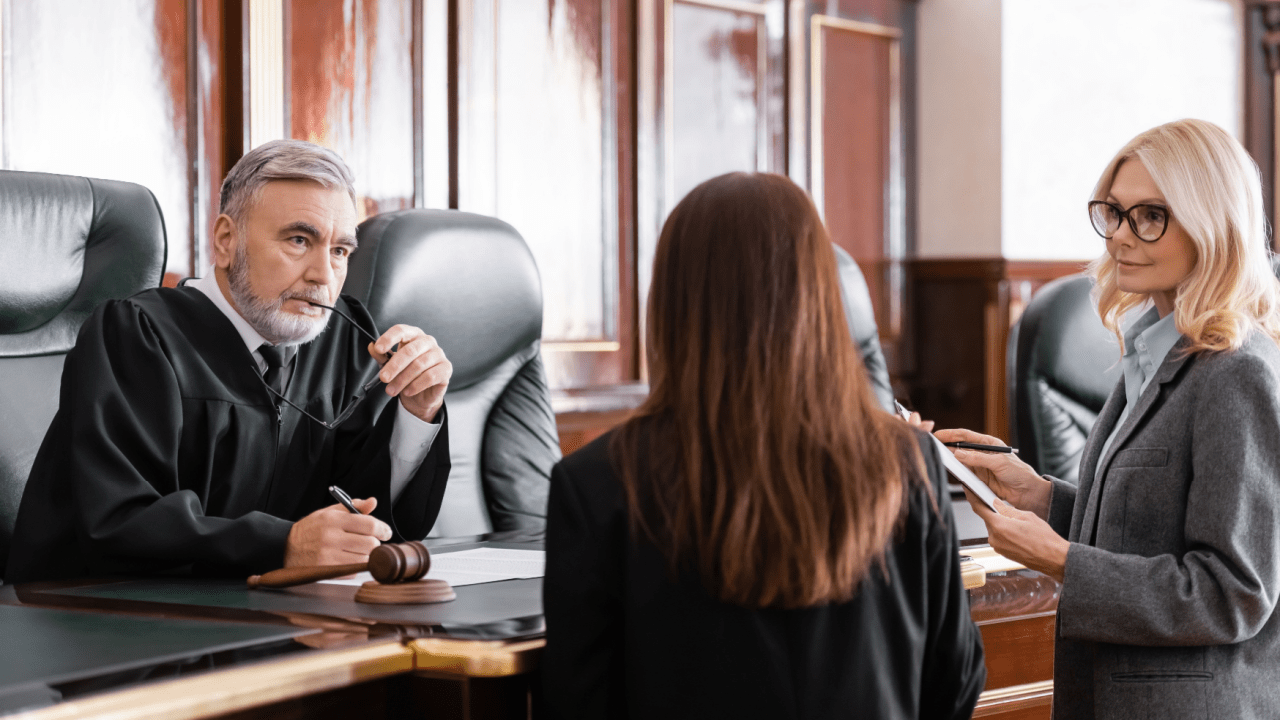 Defendant learning how to ask a judge for leniency in traffic court with attorney present