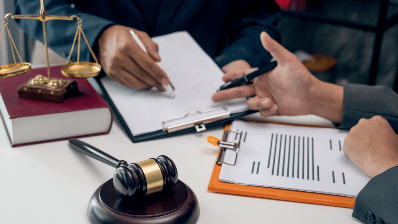 Understanding what evidence helps contest a ticket during legal consultation with attorney reviewing documentation and case details