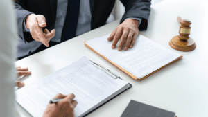 Attorney explaining what is the best defense against a ticket during legal consultation with client