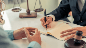 CDL enforcement legal consultation with attorney reviewing commercial driver regulations and violation documentation