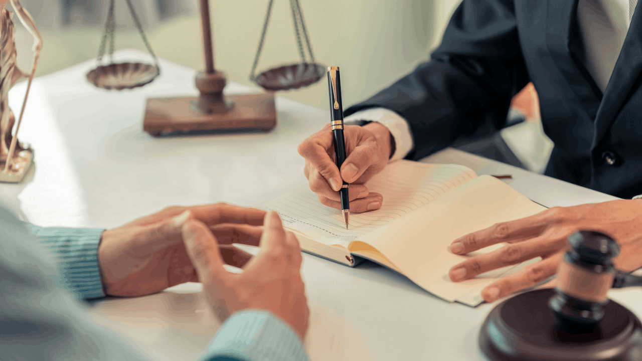 CDL enforcement legal consultation with attorney reviewing commercial driver regulations and violation documentation