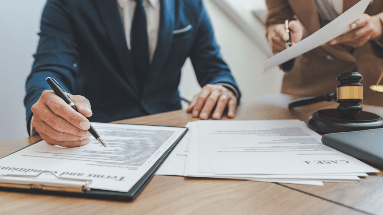 Legal consultation discussing strictness and severity of state DUI laws with gavel on desk
