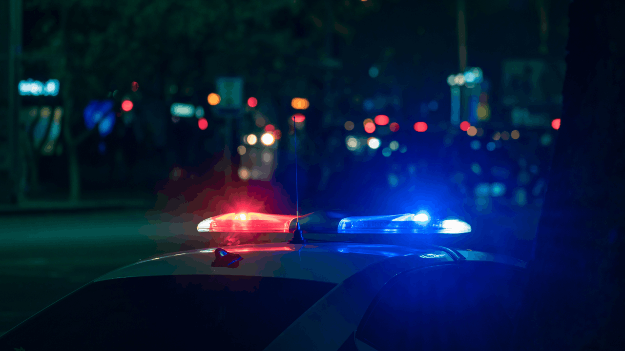 Police lights activated during traffic stop for driving commercial vehicle without CDL at night