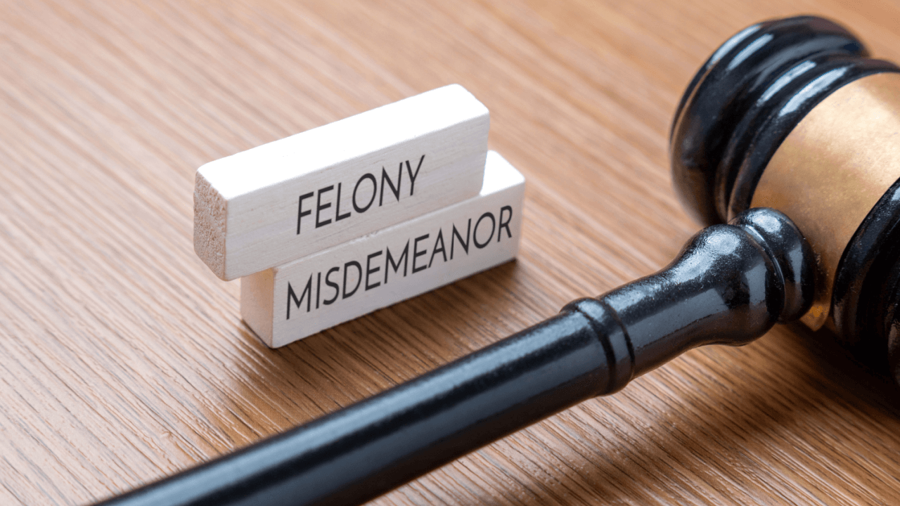 Judge's gavel with felony and misdemeanor blocks illustrating which states classify certain DUIs as felonies