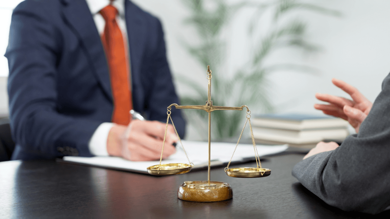 Legal professionals discussing DUI legality and drinking rules in all states with scales of justice